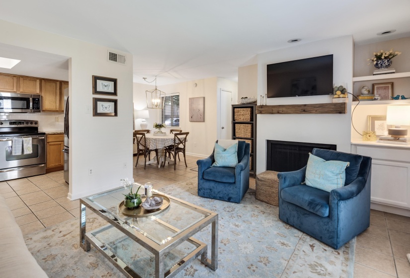 Nice Open Living Room with built-ins, fireplace, & mantle.