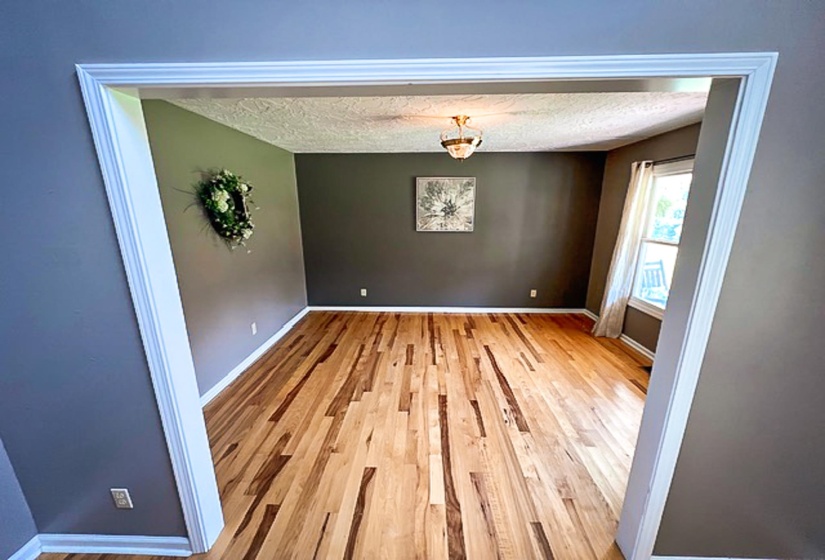 Open doorway framed with white trim
