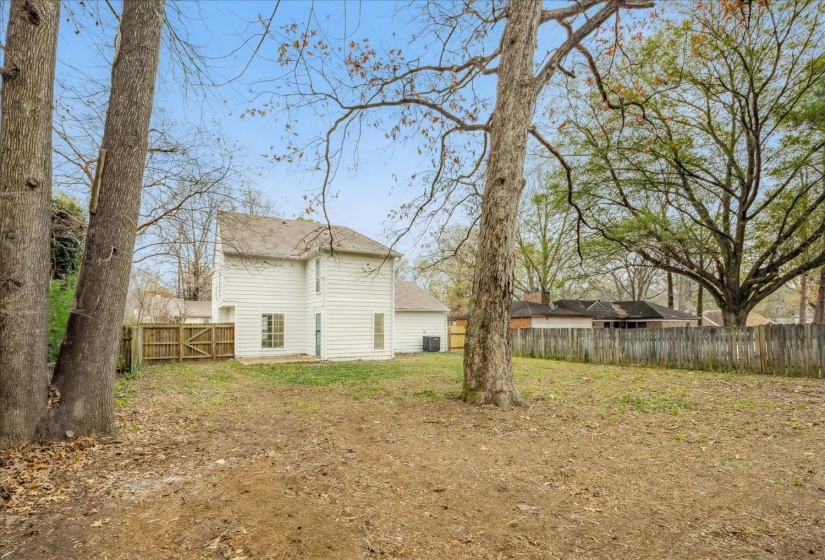View of fenced backyard