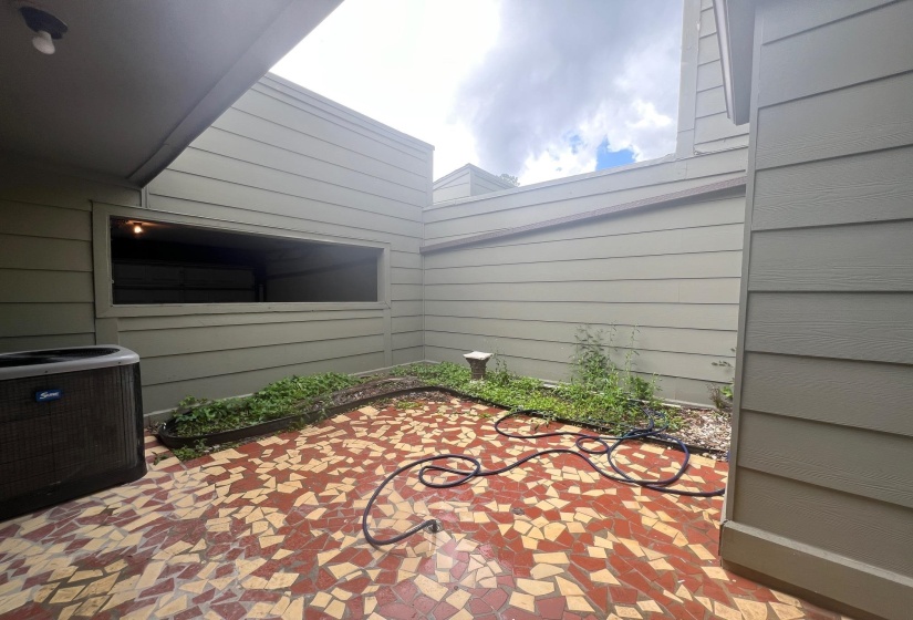 Patio/Courtyard between garage and condo