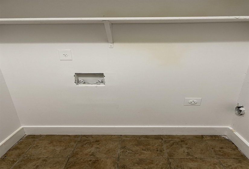 Laundry area featuring hookup for an electric dryer and washer hookup