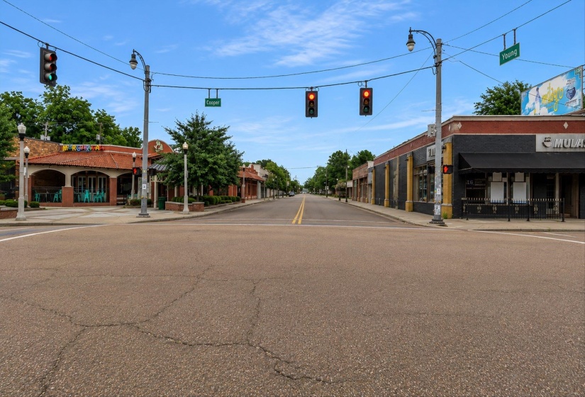 Commercial corridor featuring multiple storefronts