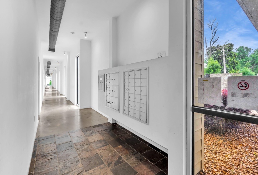 Mailbox station featuring a tiled entry floor