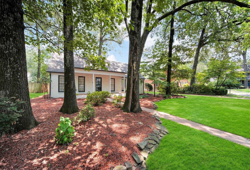 View of front of house with brick siding
