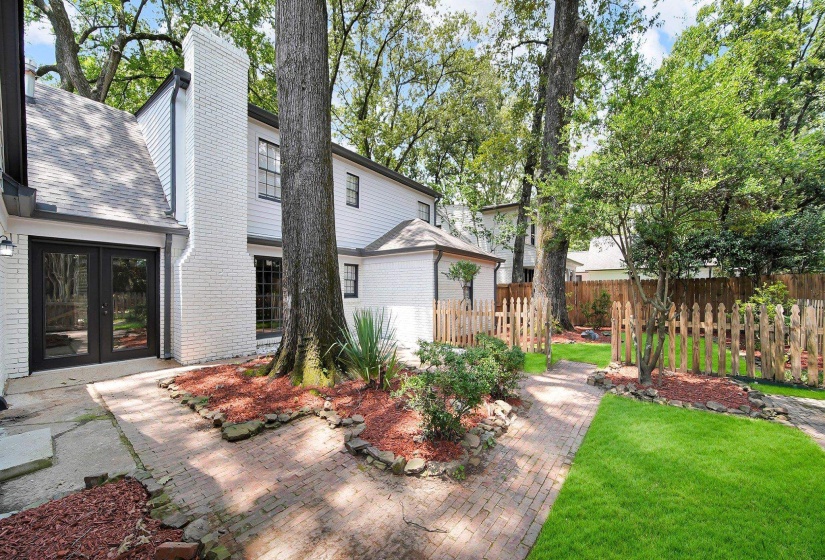 View of yard featuring french doors