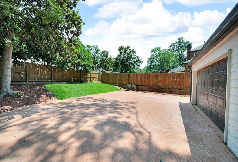 Fenced backyard featuring a patio area