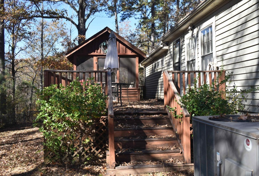 Exterior space with a deck and stairway