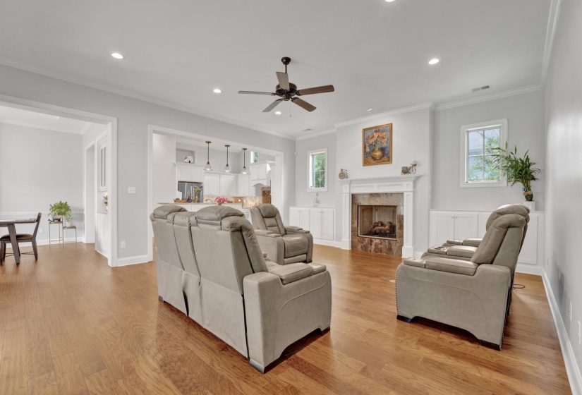 Hardwood-style flooring throughout this open-concept room