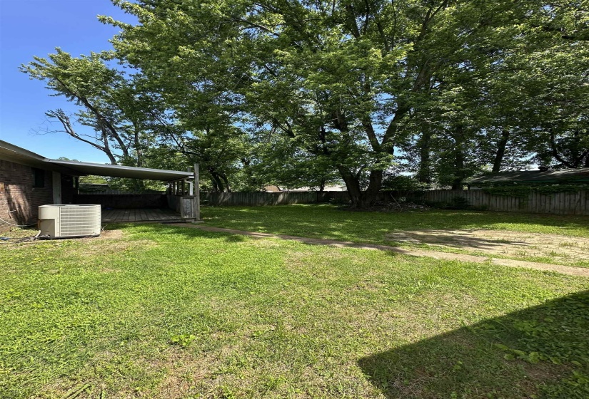 View of yard with central AC