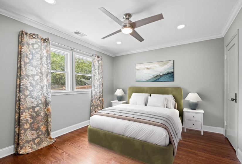 Room featuring wood-finish flooring, a ceiling fan with integrated lighting, and recessed ceiling lights