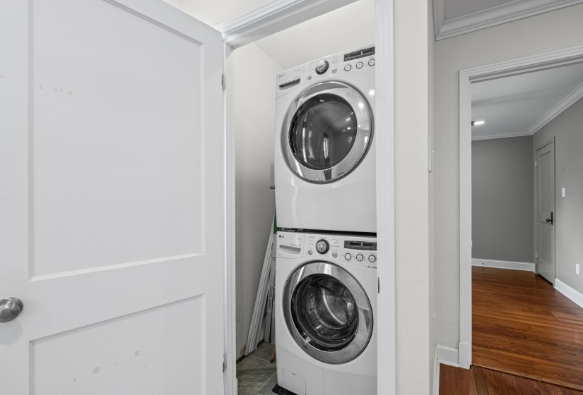 Stackable washer and dryer unit in a dedicated laundry closet