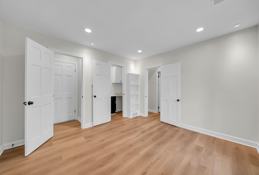 Unfurnished bedroom with recessed lighting and light wood-style flooring