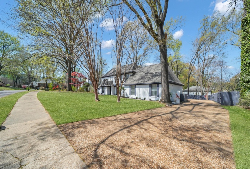 View of property exterior with roof with shingles