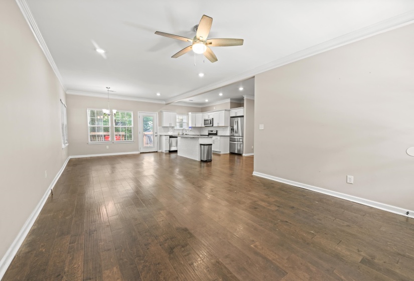 Open-concept living space with hardwood flooring