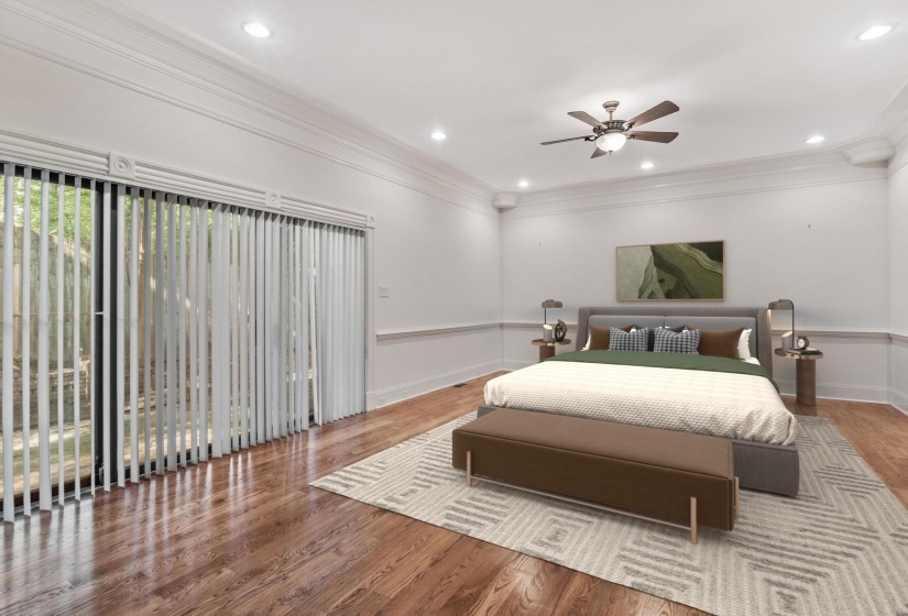 Wood-finish flooring with crown molding and recessed lighting