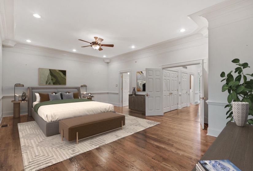 Spacious bedroom featuring wood-finish flooring and crown molding