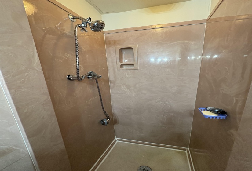 Bathroom with a stall shower