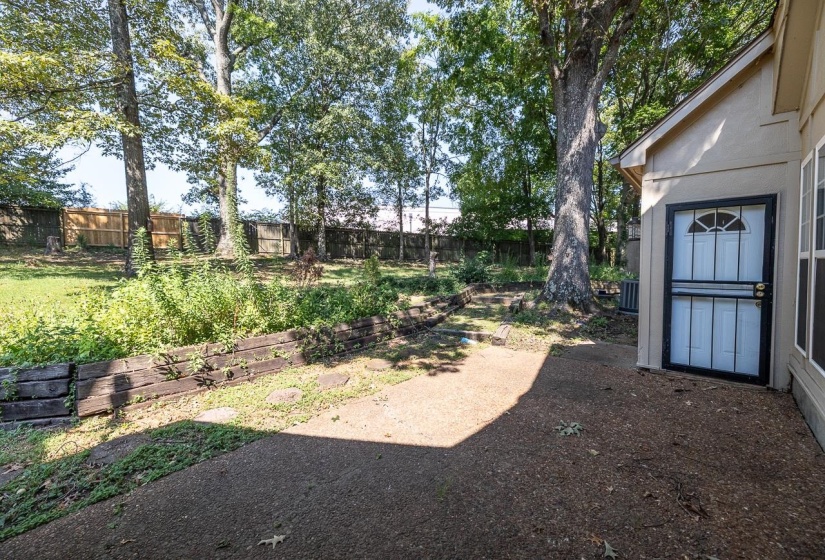 View of fenced backyard