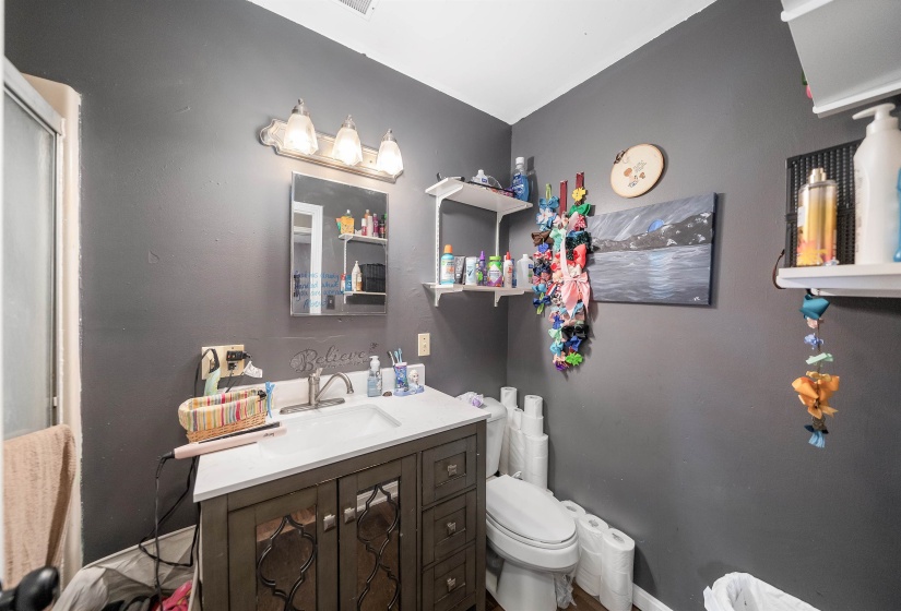 Bathroom with vanity and toilet