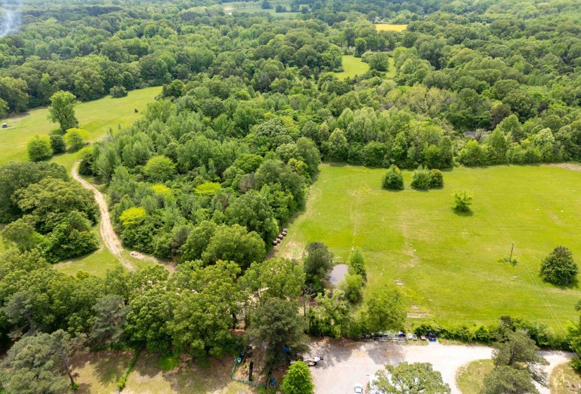 Birds eye view of property with a rural view