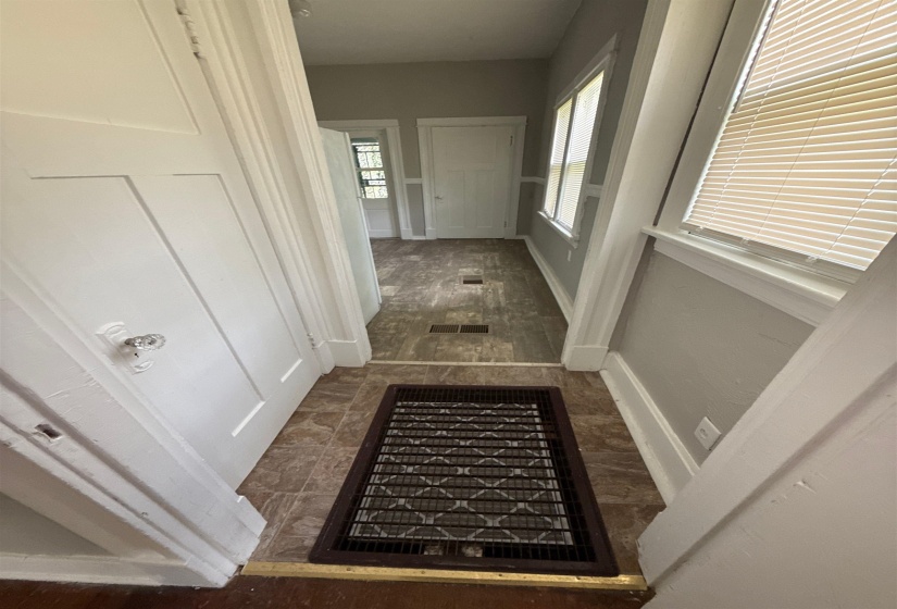 Corridor featuring baseboards
