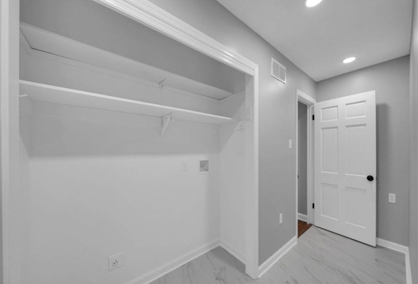 Laundry area featuring hookup for a washing machine and recessed lighting