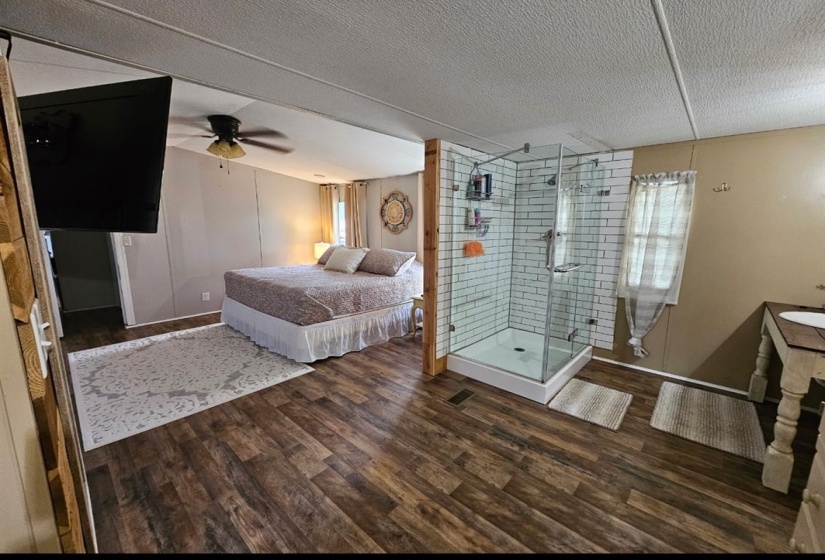 Wood-finish flooring extending throughout the open area