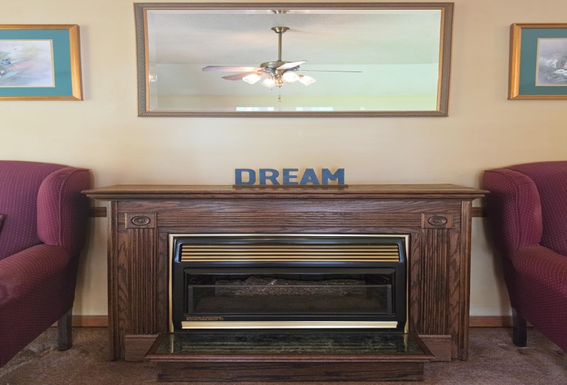 Wood-finish fireplace with an integrated firebox and hearth
