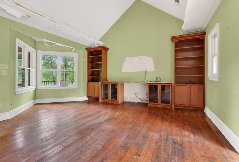 Spacious interior with rich wood-finish flooring