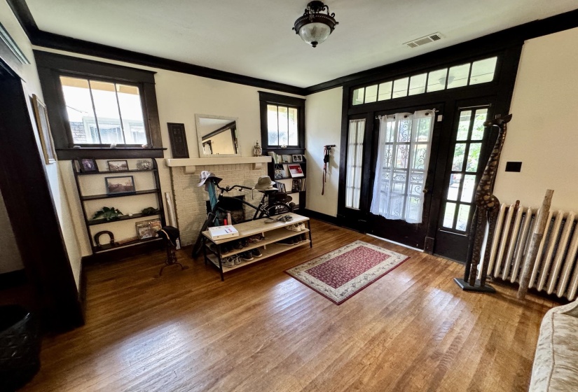 Hardwood flooring extending throughout the room