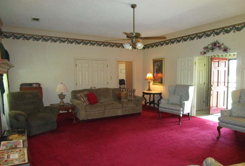 View of living room showing wet bar closet wall