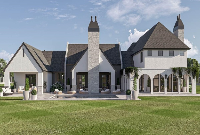 Expansive rear elevation featuring a covered patio, multiple outdoor seating areas, a swimming pool, and an arched loggia