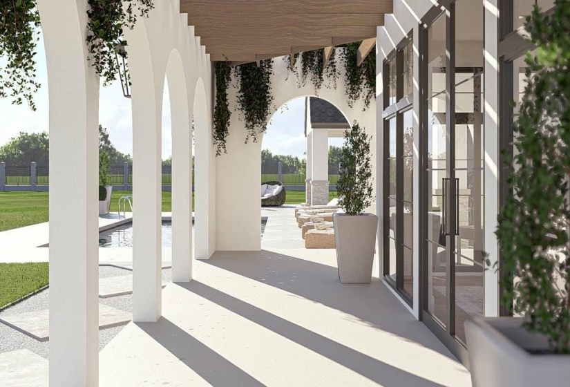 Covered patio featuring arched architectural elements and a wooden pergola