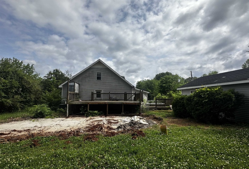 Rear view of house featuring a deck