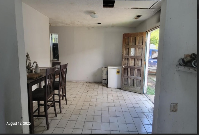Dining room featuring light tile patterned floors