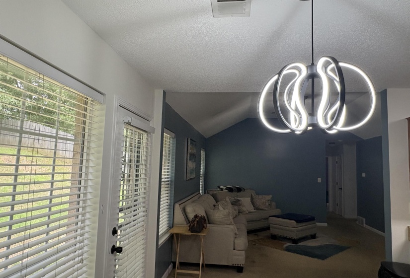 Modern chandelier with integrated LED lighting