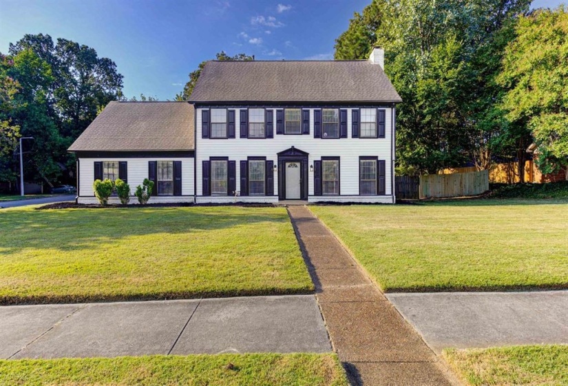 Colonial-style house with a chimney