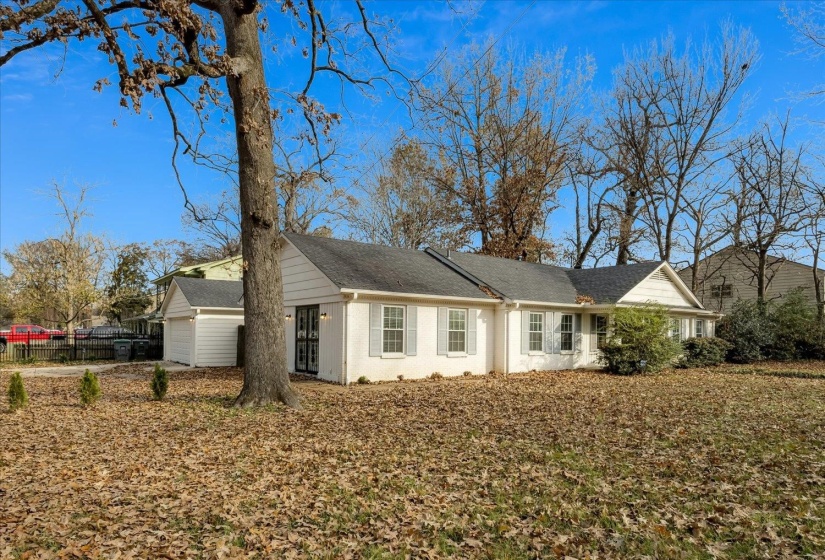 View of front of house featuring roof with shingles very desirable corner lot